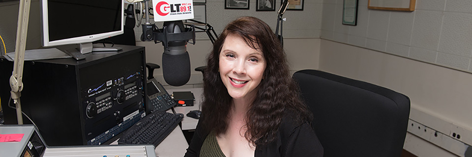 Broadcaster for WGLT Radio conducting an interview